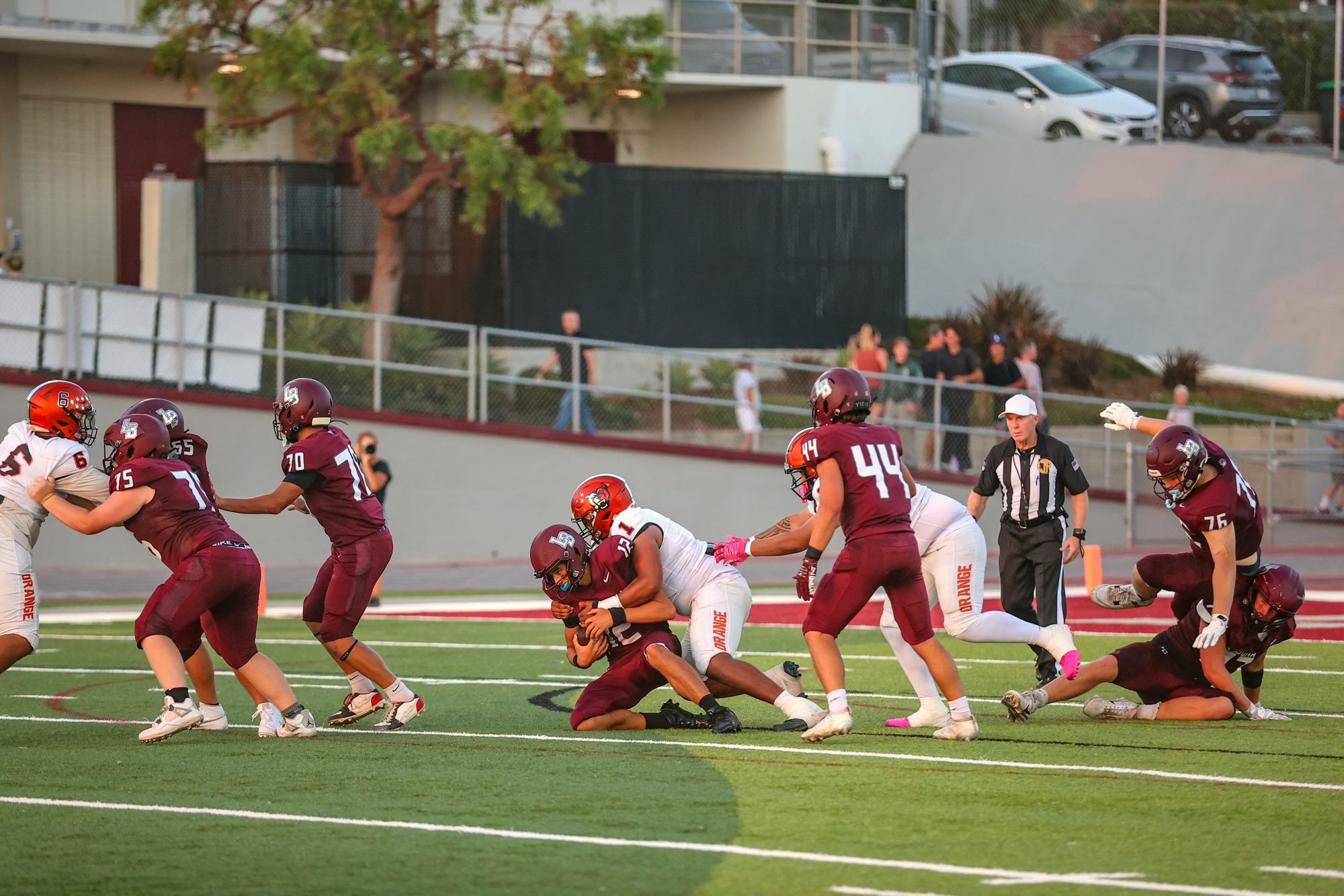 Orange Panthers offensive line at the snap