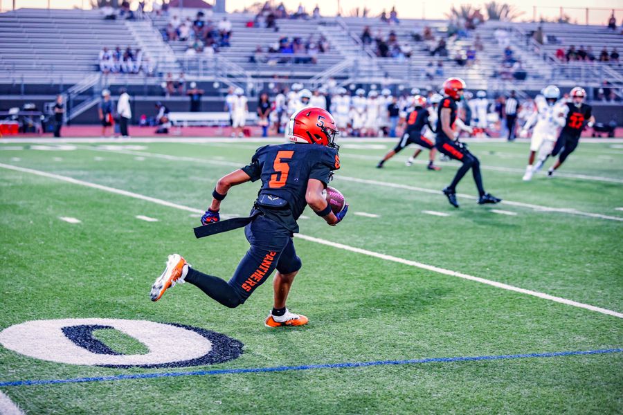 Orange Panthers #5 turning the corner with the ball