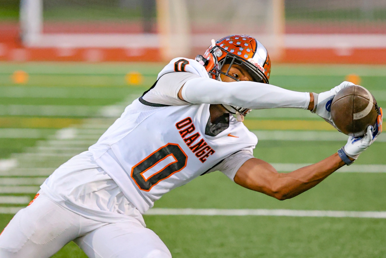 Orange Panthers receiver stretching out for the catch