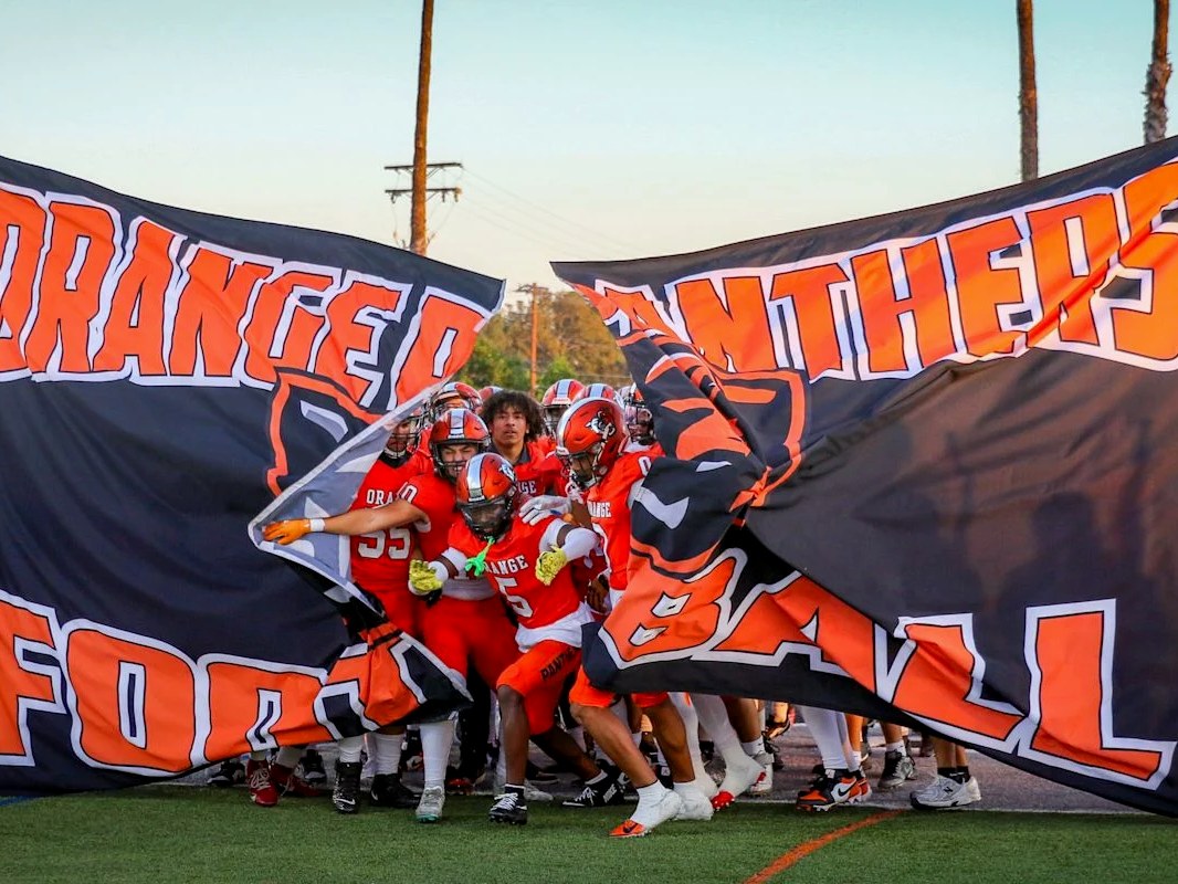 Orange Panthers breaking through the season banner