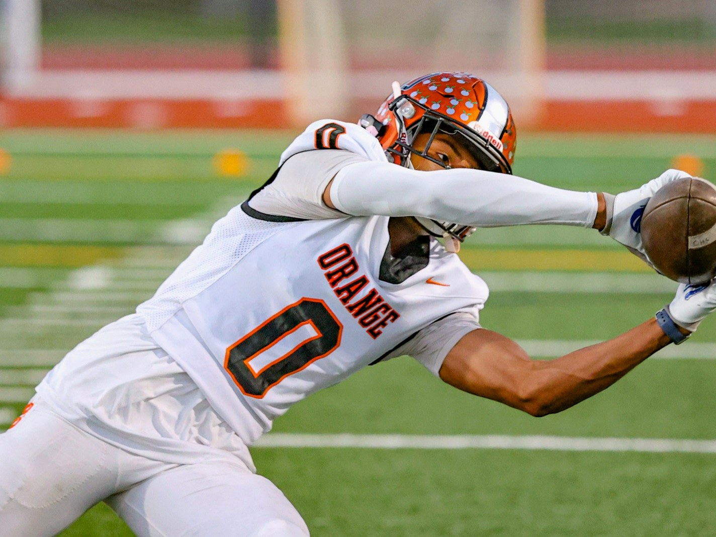 Orange Panthers receiver making a one-handed catch — the kind of play that belongs on your Hudl
